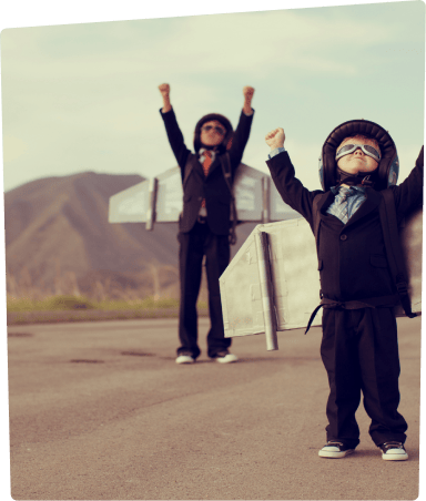 children wearing planes costumes